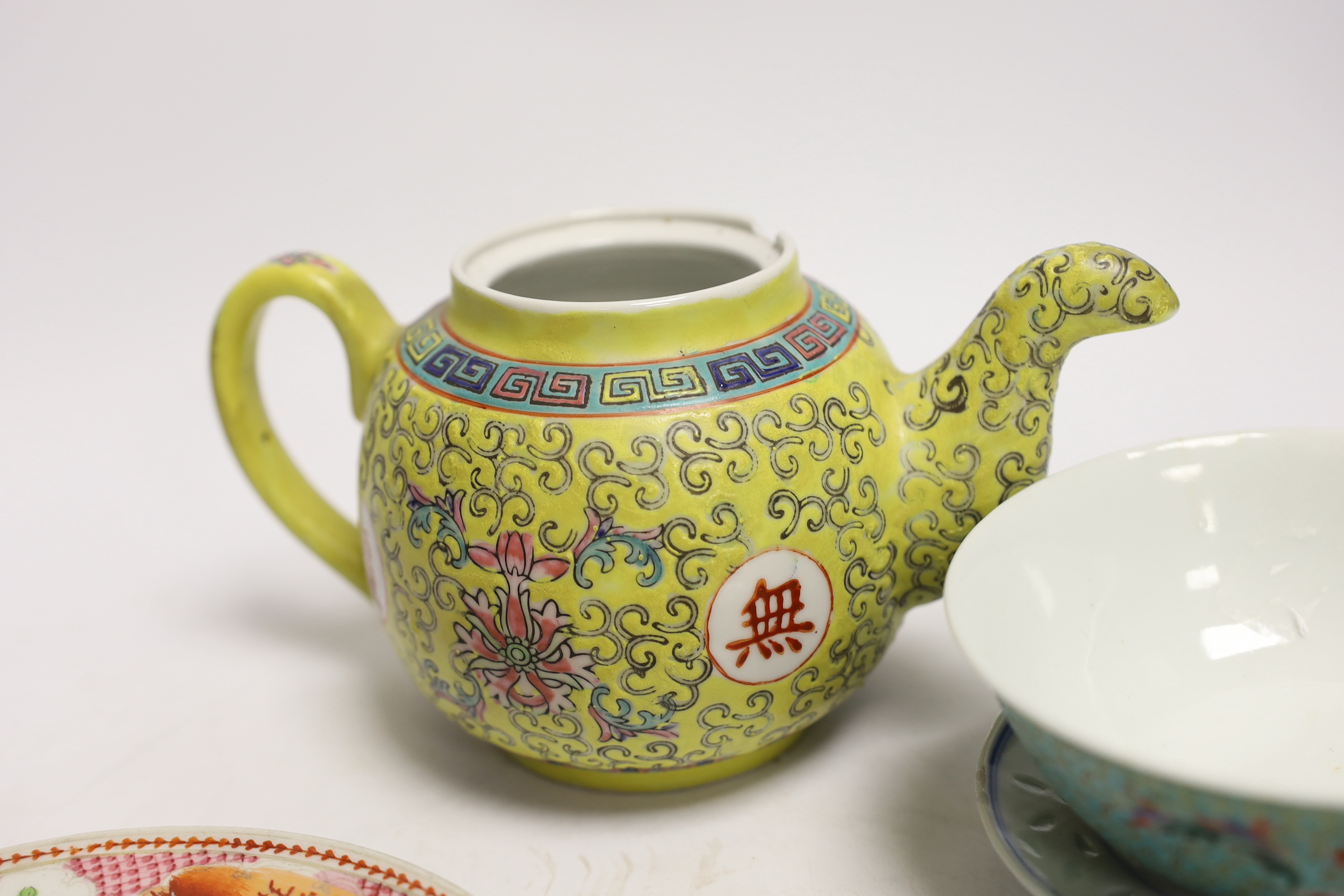 Six Chinese ceramic items; a teapot, two bowls and three small dishes, teapot 10cm